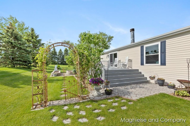7560 Derbyboro Dr Unit 315, Caledonia, MI 49316 - view of grassy yard with a deck and a patio area