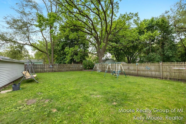607 E Coffren St, Greenville, MI 48838 - view of yard featuring a playground