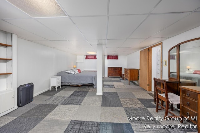 607 E Coffren St, Greenville, MI 48838 - bedroom featuring a paneled ceiling and carpet flooring