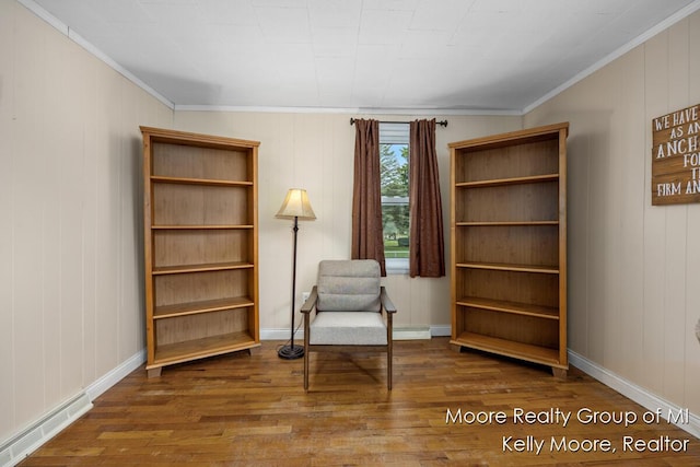 607 E Coffren St, Greenville, MI 48838 - sitting room featuring wood finished floors, ornamental molding, and baseboards