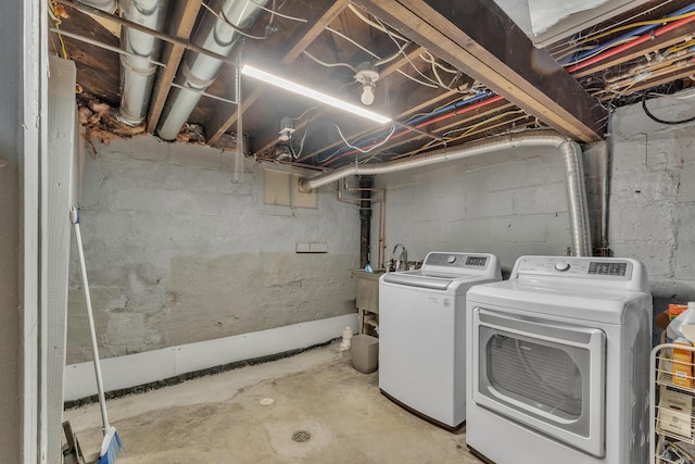 710 S 1st St, Ann Arbor, MI 48103 - unfinished below grade area with washer and clothes dryer and a sink