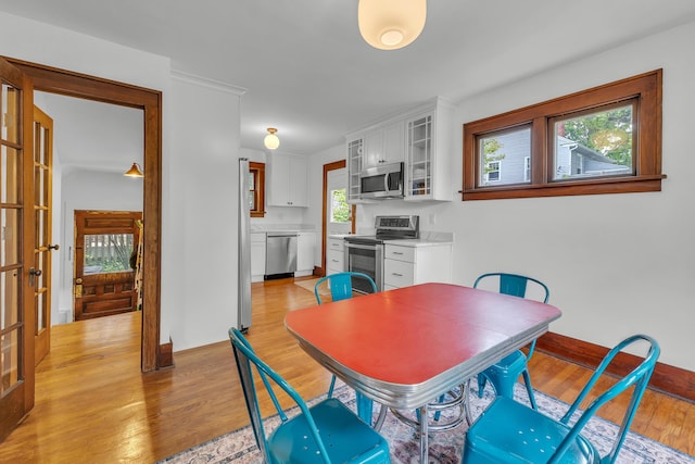 710 S 1st St, Ann Arbor, MI 48103 - dining area with light wood-type flooring