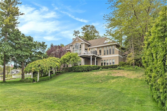 15919 Orchard Point Dr, Spring Lake, MI 49456 - back of property with a yard and stucco siding