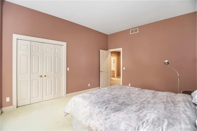 15919 Orchard Point Dr, Spring Lake, MI 49456 - bedroom with carpet floors, a closet, and baseboards