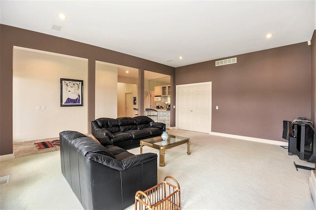 15919 Orchard Point Dr, Spring Lake, MI 49456 - living room with light colored carpet, recessed lighting, and baseboards