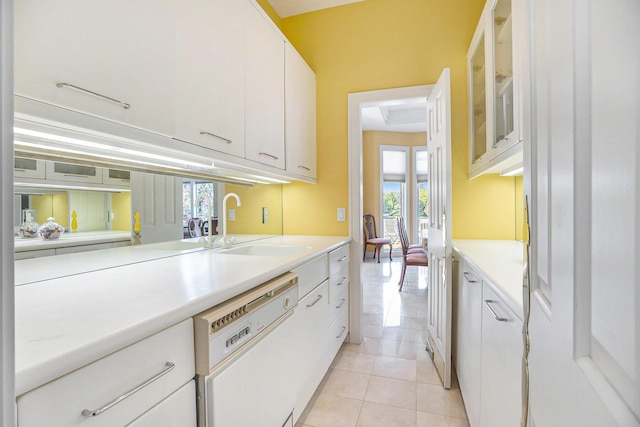 15919 Orchard Point Dr, Spring Lake, MI 49456 - kitchen featuring dishwasher, a sink, white cabinets, and light countertops