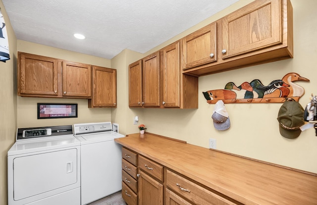 13881 Rivercrest Dr, White Pigeon, MI 49099 - laundry room featuring cabinet space, separate washer and dryer, a textured ceiling, and recessed lighting