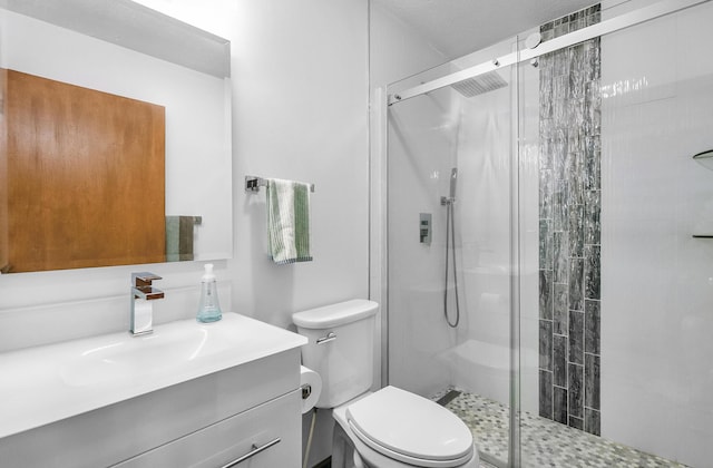 13881 Rivercrest Dr, White Pigeon, MI 49099 - full bathroom with toilet, a shower stall, and vanity