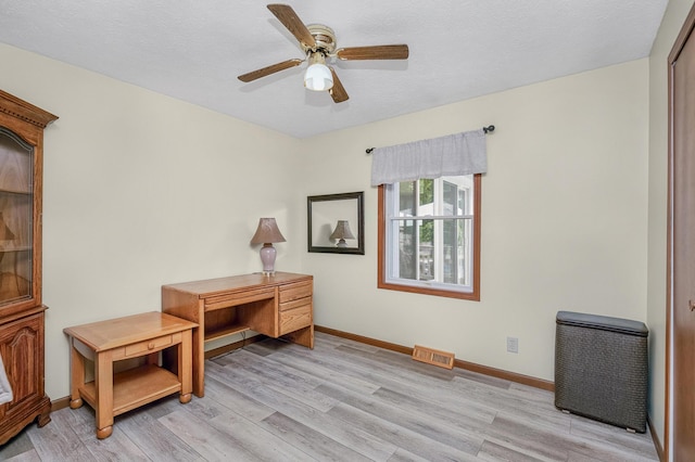 13881 Rivercrest Dr, White Pigeon, MI 49099 - office area with light wood-style flooring, baseboards, and a ceiling fan