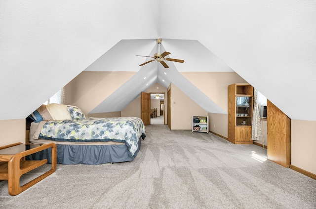 13881 Rivercrest Dr, White Pigeon, MI 49099 - carpeted bedroom featuring lofted ceiling, a ceiling fan, and baseboards