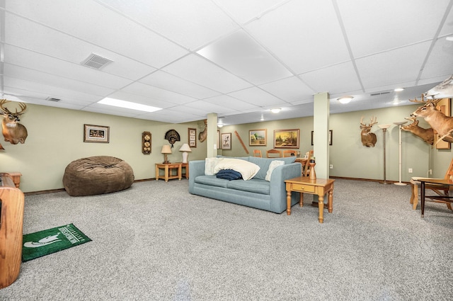 13881 Rivercrest Dr, White Pigeon, MI 49099 - living room with a paneled ceiling, carpet flooring, and baseboards