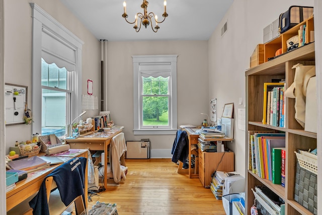 2486 Whitmore Lake Rd, Ann Arbor, MI 48105 - office area with a chandelier and hardwood / wood-style floors