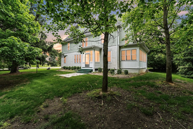 2486 Whitmore Lake Rd, Ann Arbor, MI 48105 - view of side of property with a balcony and a yard