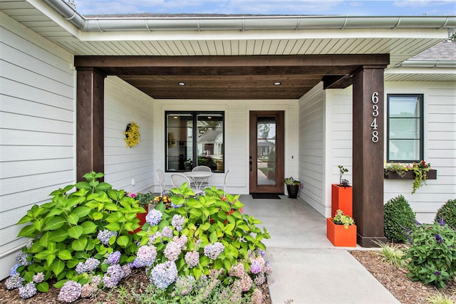 6348 Lamppost Cir SE, Grand Rapids, MI 49546 - doorway to property featuring a porch