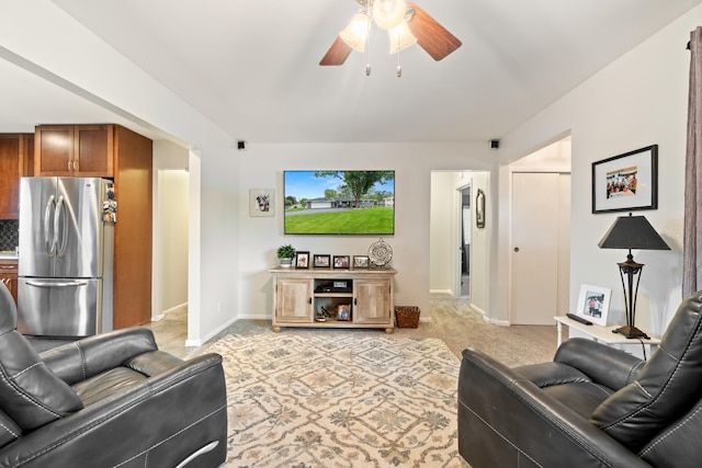 1403 Joseph St, Jackson, MI 49202 - living area with ceiling fan, light colored carpet, and baseboards