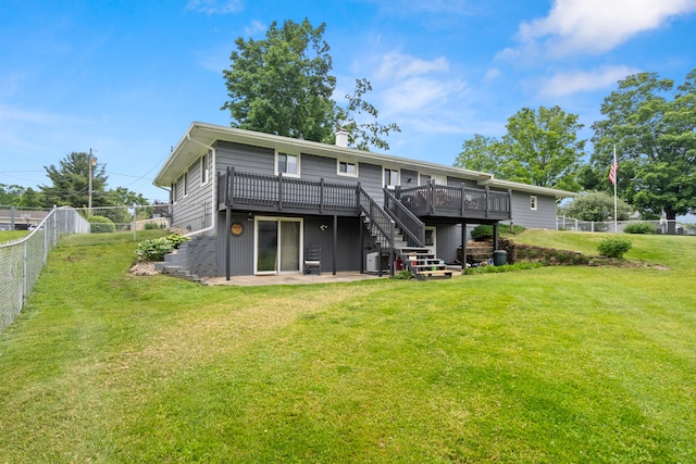 1403 Joseph St, Jackson, MI 49202 - rear view of house featuring a deck, stairway, and a chimney