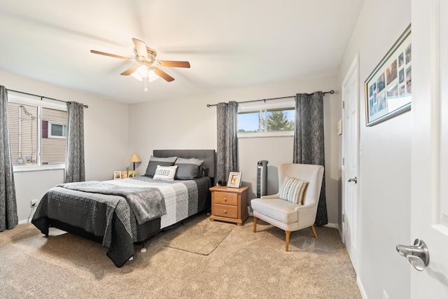 1403 Joseph St, Jackson, MI 49202 - bedroom featuring light carpet, baseboards, and a ceiling fan