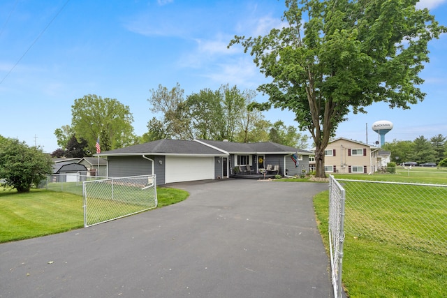 1403 Joseph St, Jackson, MI 49202 - single story home with a garage and asphalt driveway