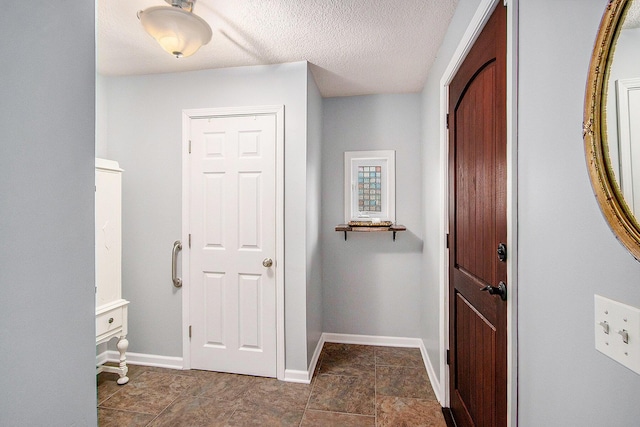 10933 Portage Rd, Portage, MI 49002 - hall with baseboards and a textured ceiling