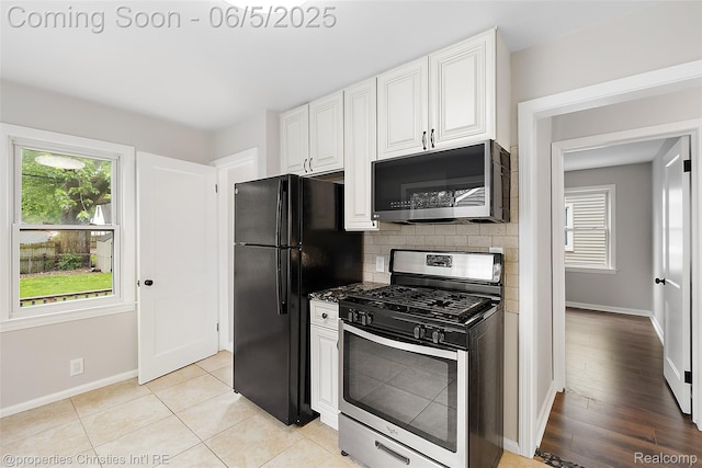 2193 Earlmont Rd, Berkley, MI 48072 - kitchen featuring stainless steel appliances, white cabinetry, baseboards, and decorative backsplash