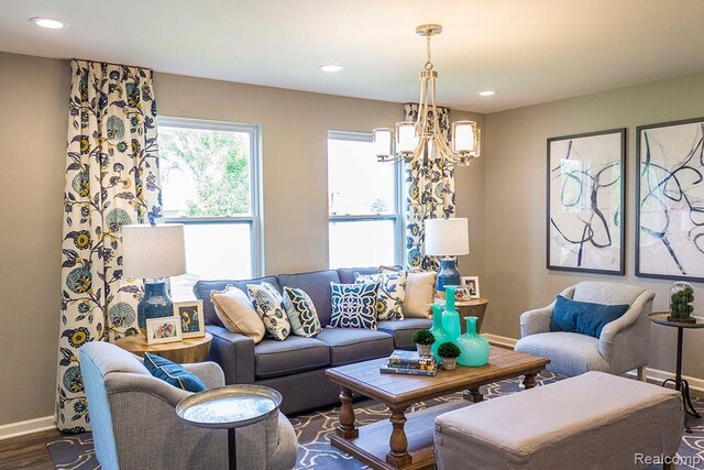 58182 Pembrooke Ave, New Haven, MI 48048 - living room with baseboards, a chandelier, recessed lighting, and dark wood-style floors