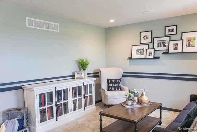 58182 Pembrooke Ave, New Haven, MI 48048 - sitting room with recessed lighting, carpet floors, and baseboards