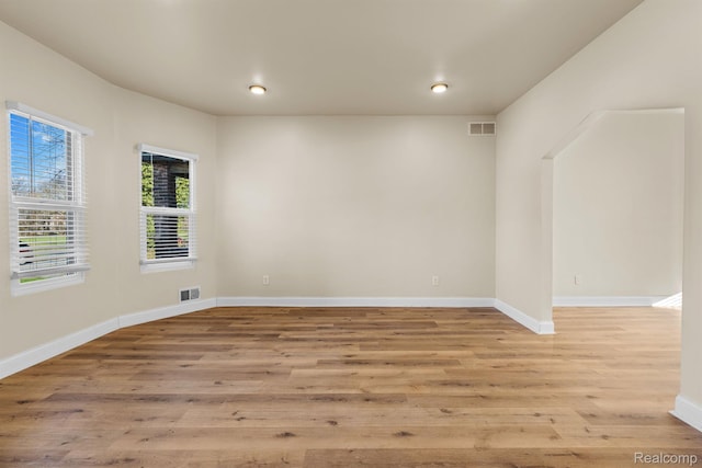 1502 Harding St, Detroit, MI 48214 - empty room featuring light wood-style flooring, baseboards, and recessed lighting