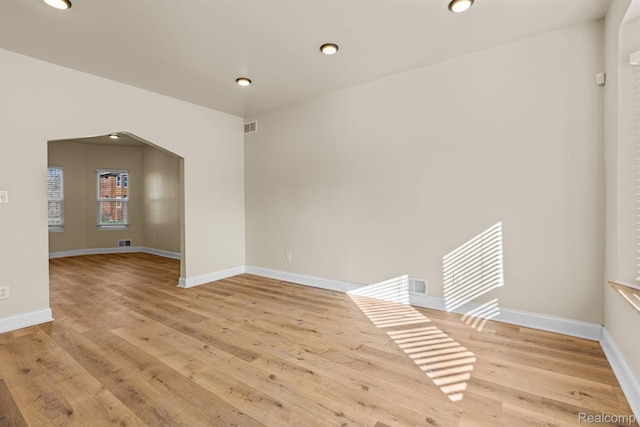 1502 Harding St, Detroit, MI 48214 - empty room with wood finished floors, baseboards, and recessed lighting