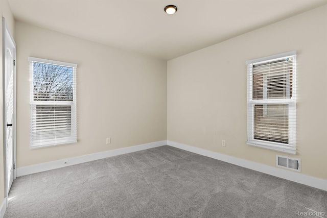 1502 Harding St, Detroit, MI 48214 - carpeted empty room with baseboards