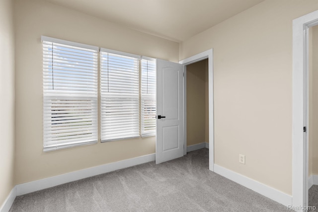 1502 Harding St, Detroit, MI 48214 - unfurnished bedroom featuring carpet and baseboards