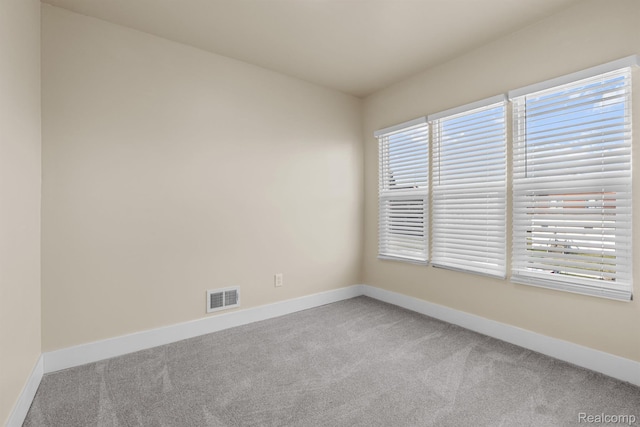1502 Harding St, Detroit, MI 48214 - carpeted spare room with baseboards