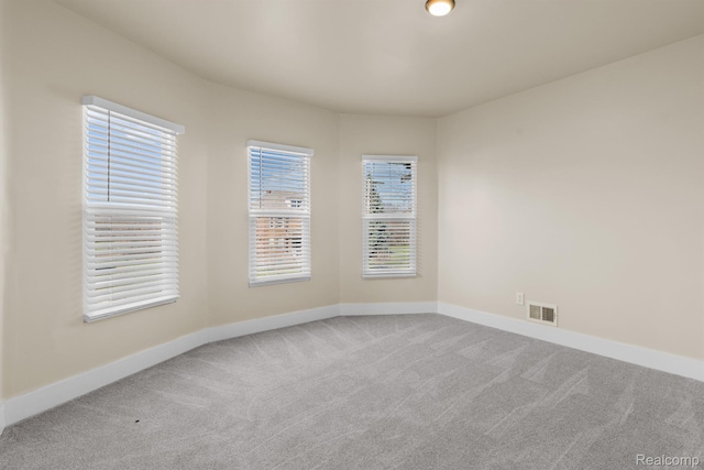 1502 Harding St, Detroit, MI 48214 - spare room with carpet flooring and baseboards