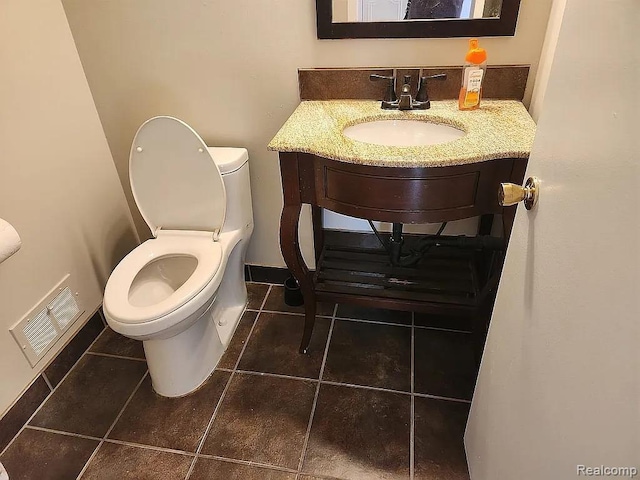953 Kirts Blvd, Troy, MI 48084 - half bath featuring toilet, tile patterned floors, and vanity