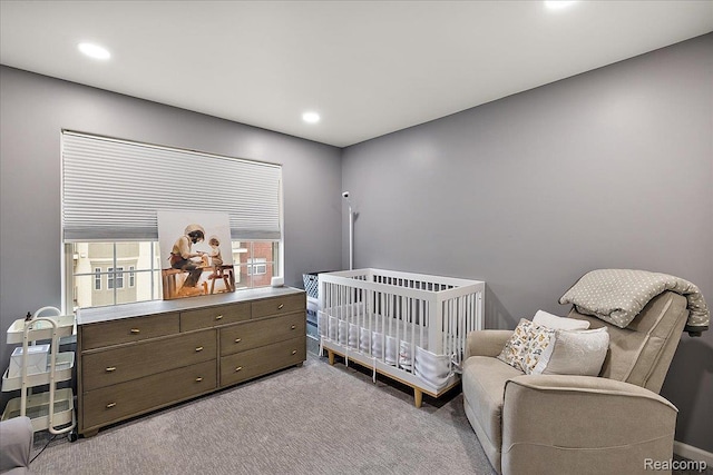 3070 Camden Dr, Troy, MI 48084 - carpeted bedroom with recessed lighting, baseboards, and a nursery area