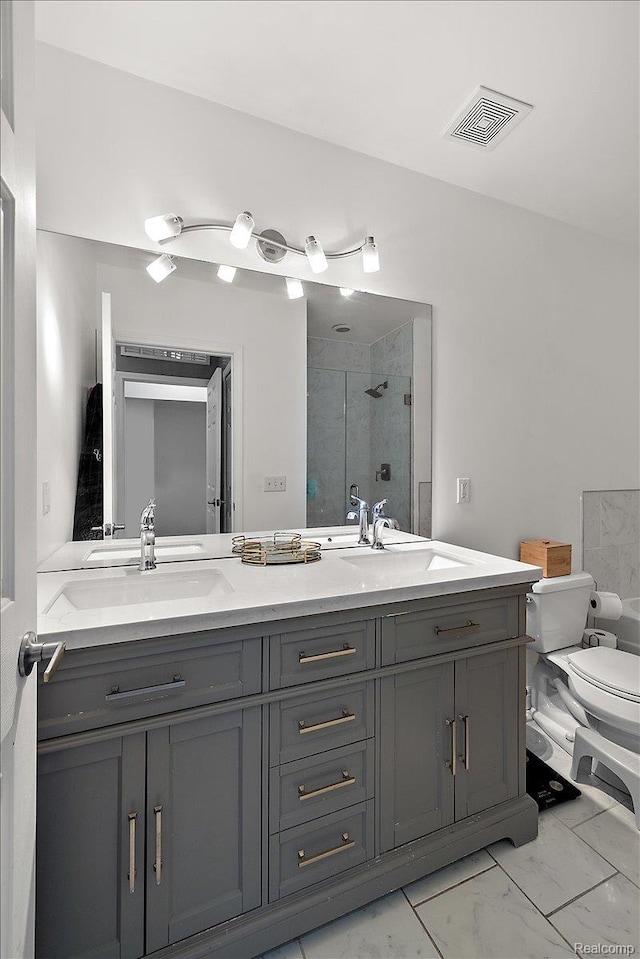 3070 Camden Dr, Troy, MI 48084 - bathroom with a stall shower, double vanity, toilet, and marble finish flooring