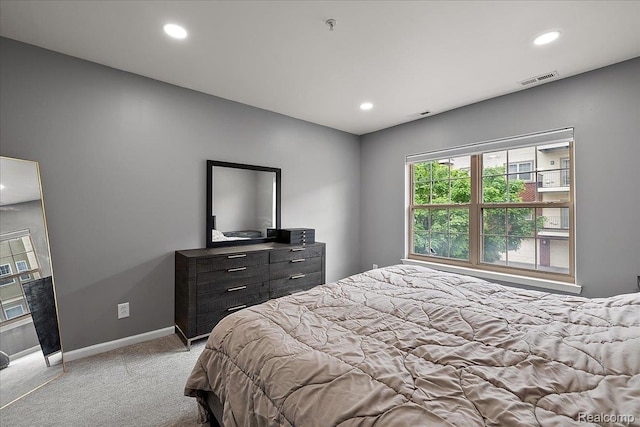 3070 Camden Dr, Troy, MI 48084 - bedroom with light carpet, multiple windows, baseboards, and recessed lighting