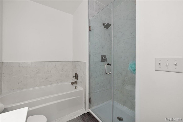 3070 Camden Dr, Troy, MI 48084 - bathroom with a garden tub, a stall shower, toilet, and vanity