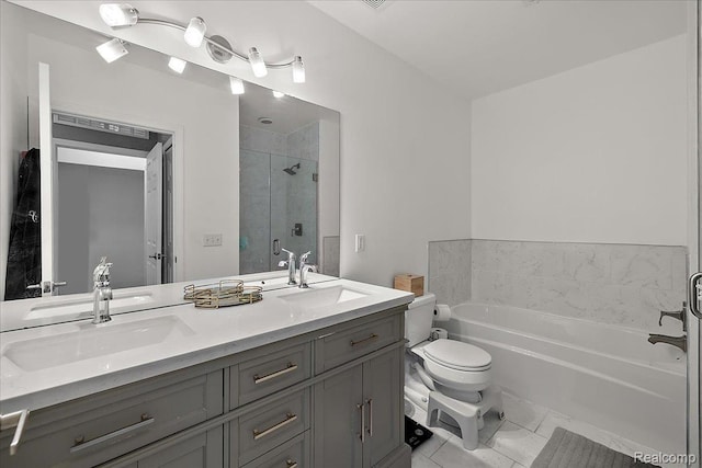 3070 Camden Dr, Troy, MI 48084 - bathroom featuring toilet, a garden tub, double vanity, and a stall shower