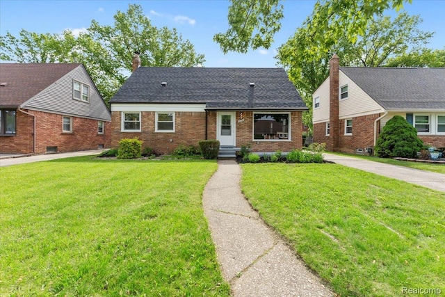 16355 Windermere Cir, Romulus, MI 48195 - view of front of property featuring brick siding, a chimney, a front lawn, and a shingled roof