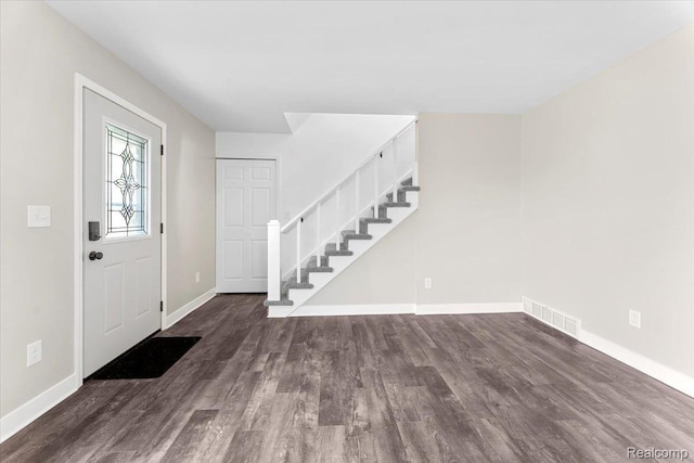 16355 Windermere Cir, Romulus, MI 48195 - foyer with stairway, baseboards, and wood finished floors