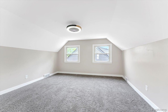 16355 Windermere Cir, Romulus, MI 48195 - additional living space featuring carpet, lofted ceiling, and baseboards