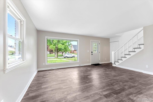 16355 Windermere Cir, Romulus, MI 48195 - foyer with stairway, baseboards, and dark wood-style flooring