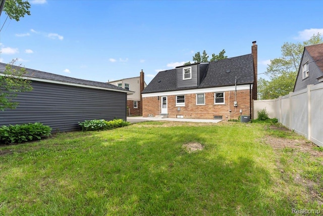 16355 Windermere Cir, Romulus, MI 48195 - back of house with a patio, a chimney, cooling unit, and brick siding