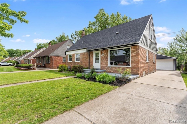 16355 Windermere Cir, Romulus, MI 48195 - view of front of home with brick siding, roof with shingles, a front yard, and a detached garage