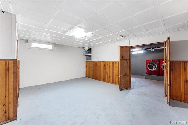 16355 Windermere Cir, Romulus, MI 48195 - below grade area featuring wooden walls, separate washer and dryer, and a wainscoted wall