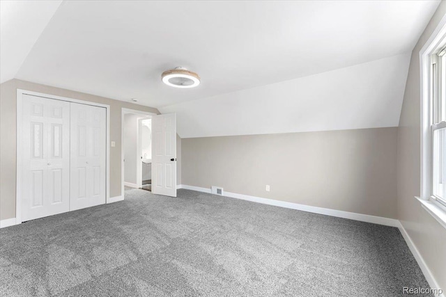 16355 Windermere Cir, Romulus, MI 48195 - bonus room featuring lofted ceiling, carpet, and baseboards