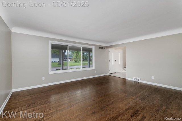 1607 Yorktown St, Grosse Pointe Farms, MI 48236 - empty room featuring baseboards and wood finished floors