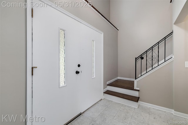 1607 Yorktown St, Grosse Pointe Farms, MI 48236 - foyer featuring stairway and baseboards