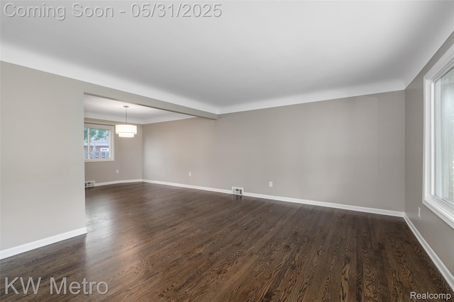 1607 Yorktown St, Grosse Pointe Farms, MI 48236 - spare room with dark wood-style floors and baseboards