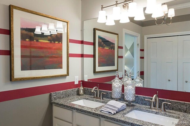 14268 Durant St, Fenton, MI 48451 - full bath featuring double vanity and a chandelier